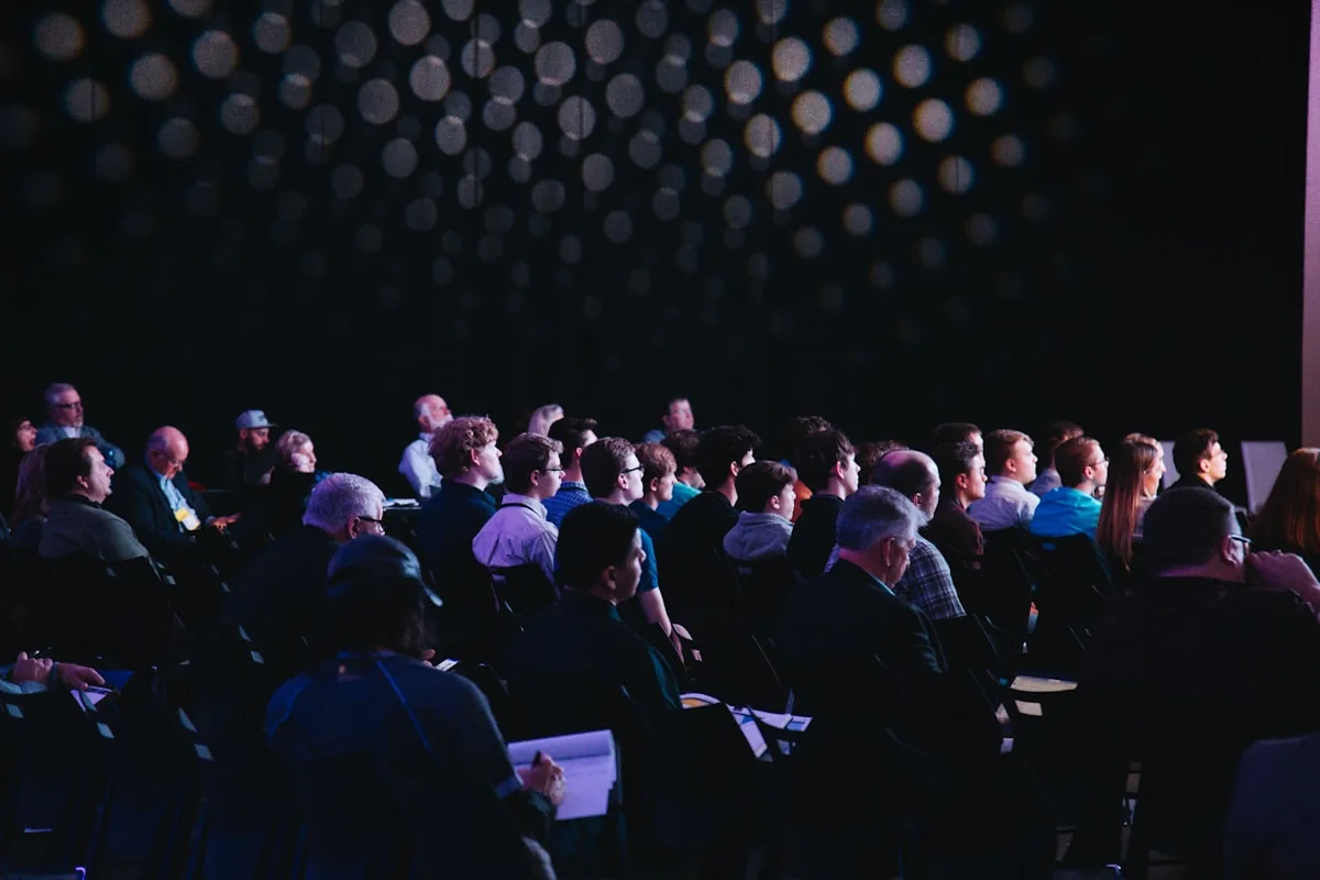 Stock photograph of an audience at a technology conference